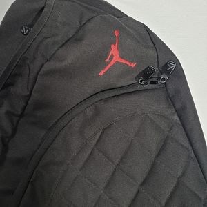 Jordan one strap black backpack red jordan emblem